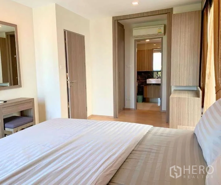 Condominium for rent - Master bedroom view toward walk-through closet and ensuite bathroom.