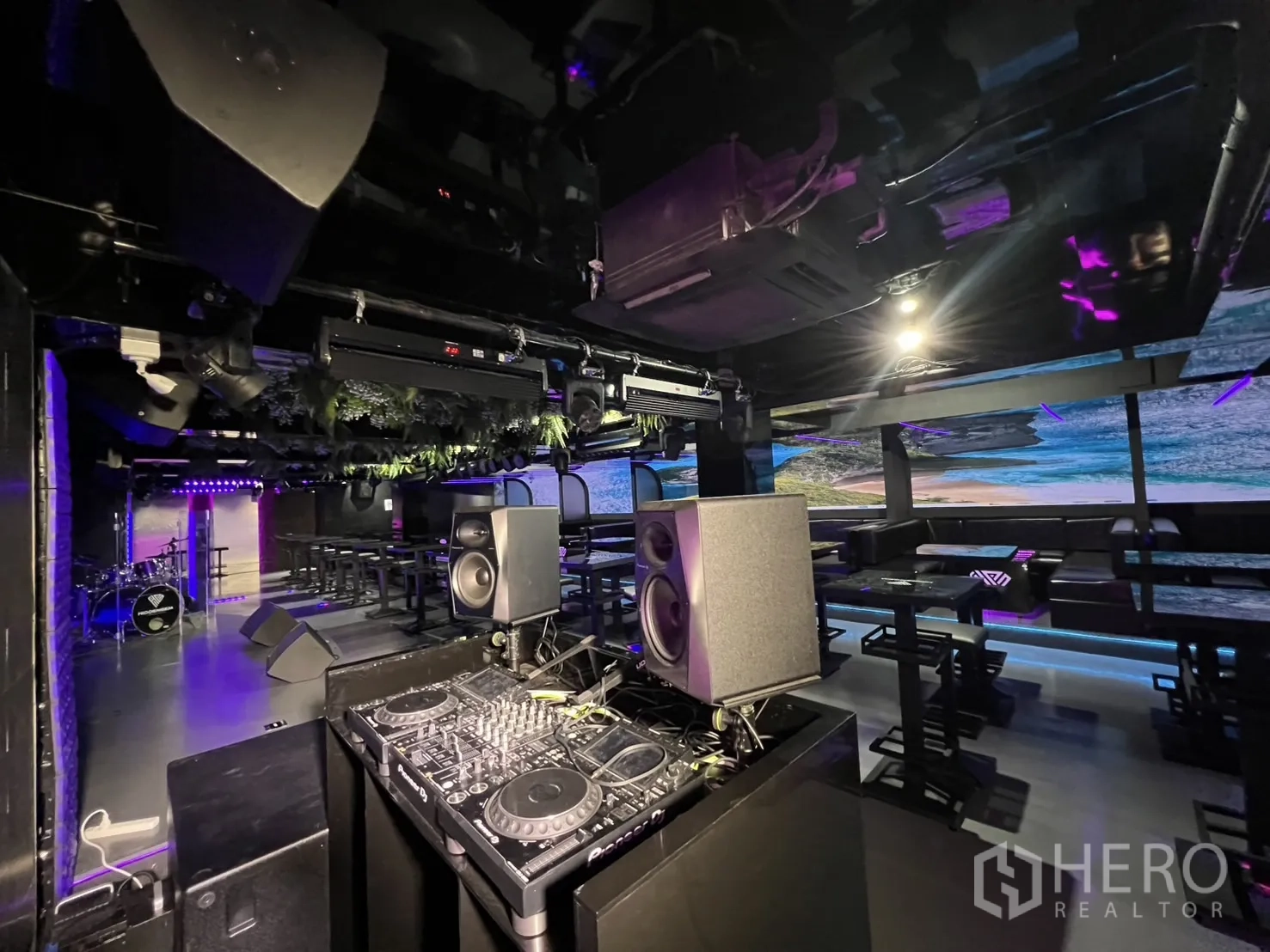Retail Space for rent in Watthana, Bangkok - DJ booth with mixers and speakers overlooking the stage and seating area.