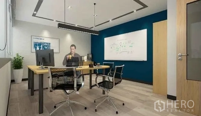 Office Space for rent in Chatuchak, Bangkok - Private executive office with desk, blue accent wall and wall-mounted whiteboard.