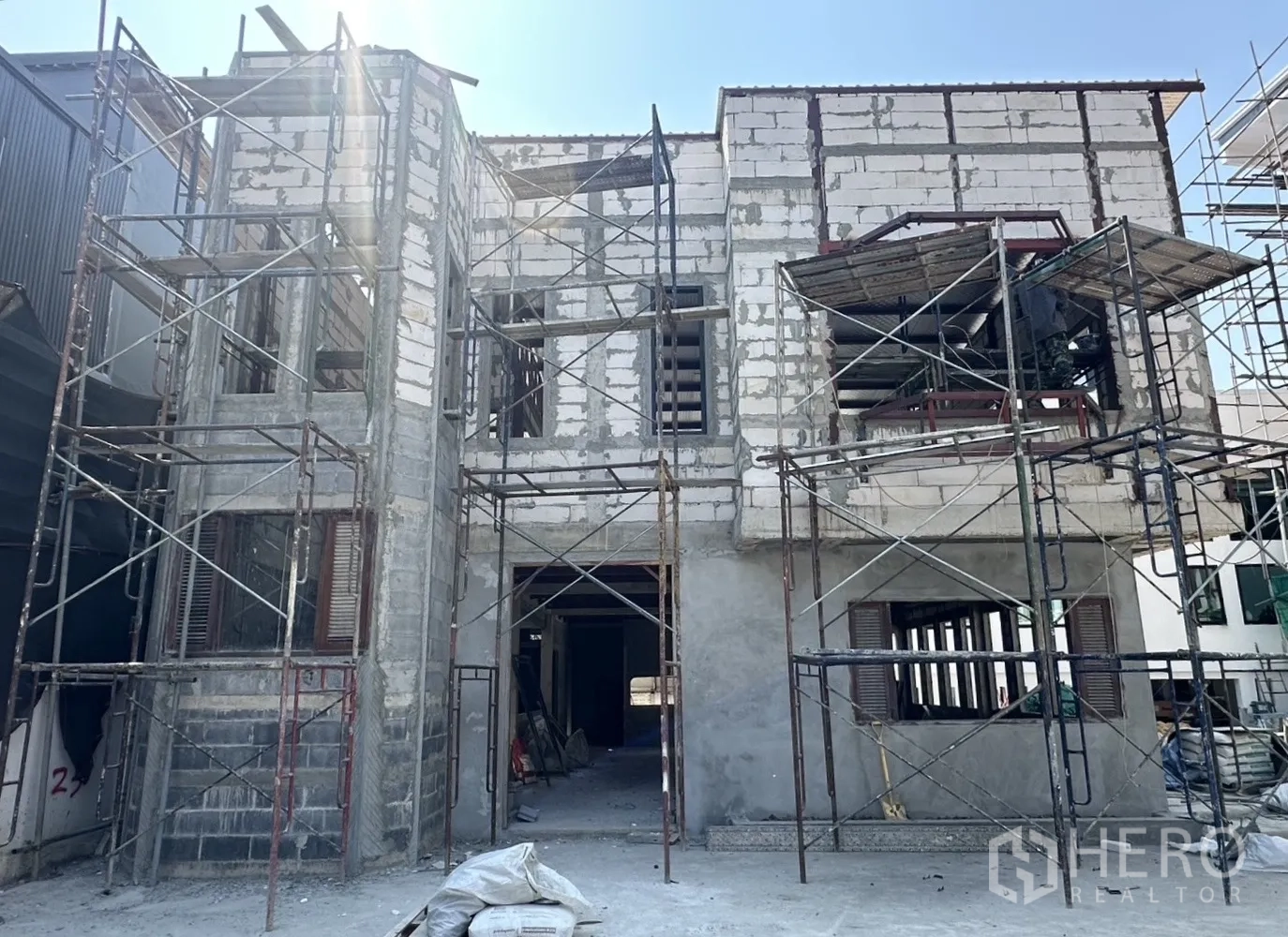 Retail Space for rent in Bang Na, Bangkok - Two-storey retail building under renovation with scaffolding on the facade in Sukhumvit.