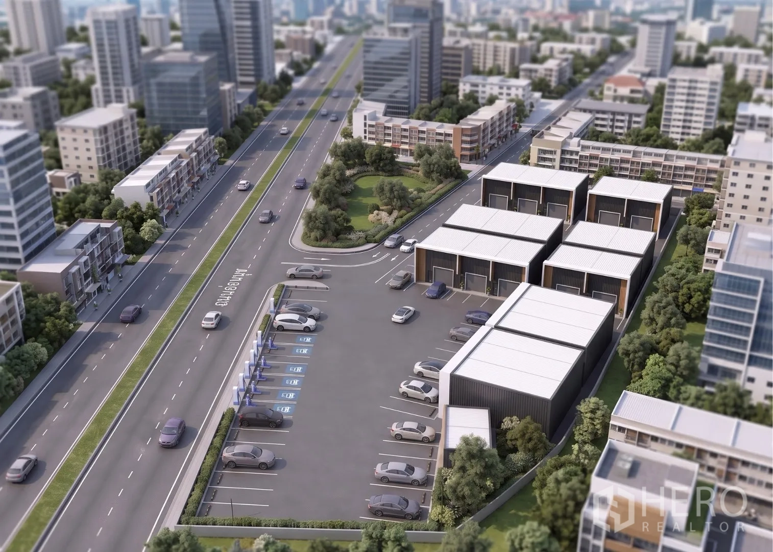 Warehouse for rent in Prawet, Bangkok - Aerial view of the warehouse complex with parking area beside a main road and green space.