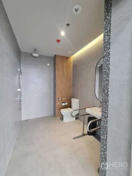 Office Space for rent in Chatuchak, Bangkok - Accessible restroom with grab bars, shower area and contemporary tiling.