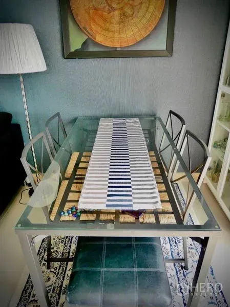 Detached House for rent or sale in Bang Phli, Samut Prakan - Dining area with glass table, striped runner and contemporary decor