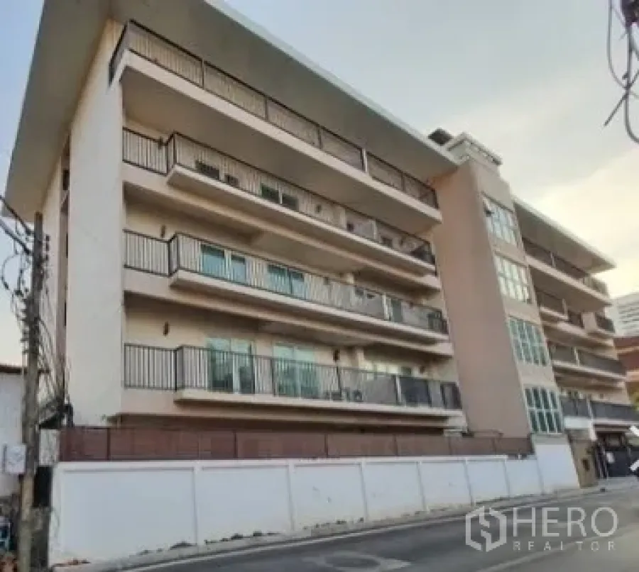 Home Office for rent - Mid-rise home office building exterior with multiple balconies in Watthana, Bangkok.
