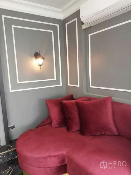 Retail Space for rent - Arched doorway leading to back area with marble floor.