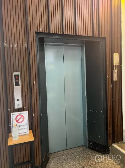 Retail Space for rent in Watthana, Bangkok - Passenger lift lobby with wood panel walls for convenient access.