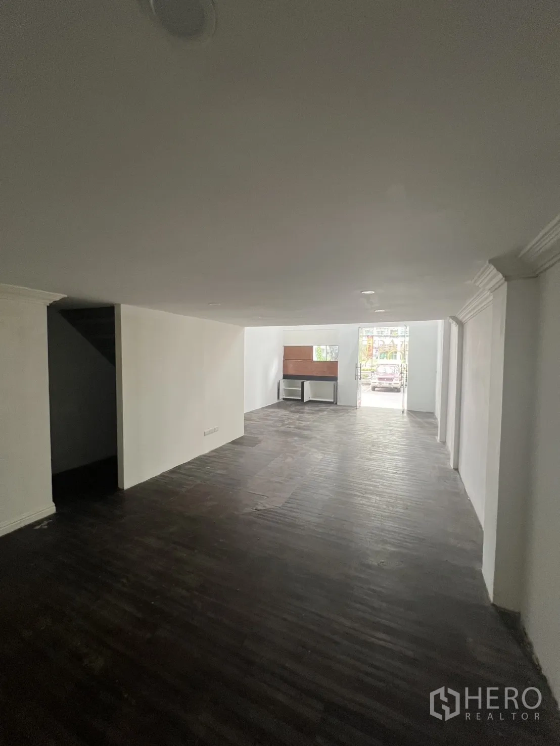 Retail Space for rent in Watthana, Bangkok - Deep shop layout from rear to front entrance showing long, flexible retail floor space.