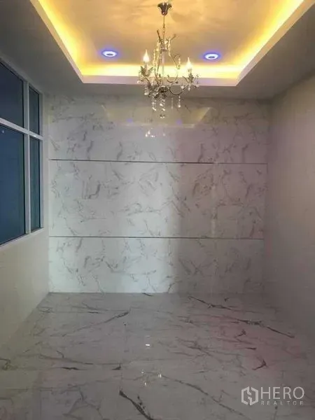 Warehouse for rent in Bang Pakong, Chachoengsao - Office or meeting room featuring marble-look walls, chandelier and recessed ceiling lights.