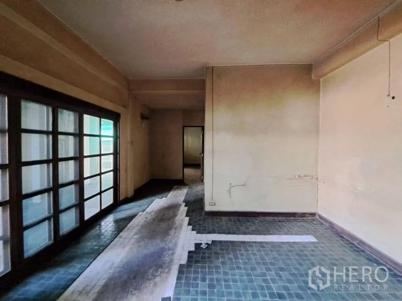Retail Space for rent in Sathon, Bangkok - Two-storey building exterior with large windows and a wide concrete forecourt.