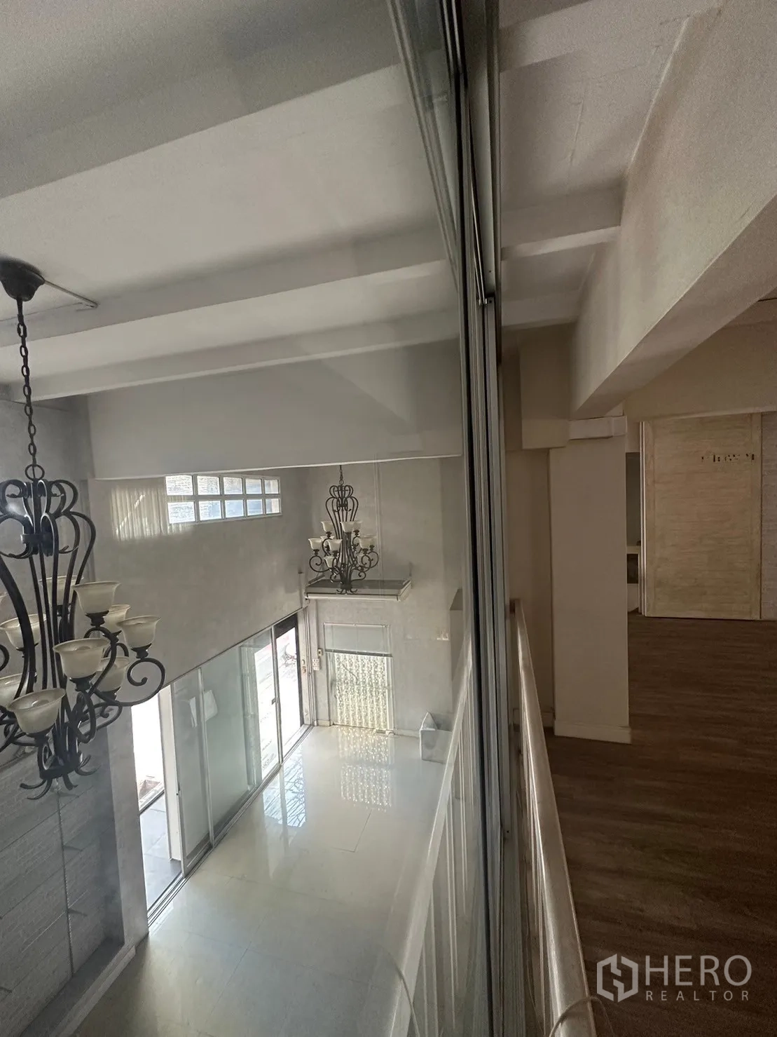 Retail Space for rent in Watthana, Bangkok - Mezzanine view overlooking the double-height lobby and glass entrance