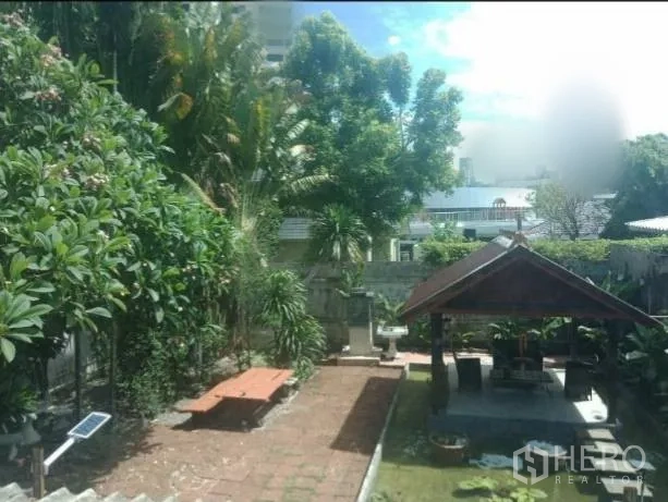 Detached House for rent in Khlong Toei, Bangkok - Lush garden with pavilion, brick path and tropical trees