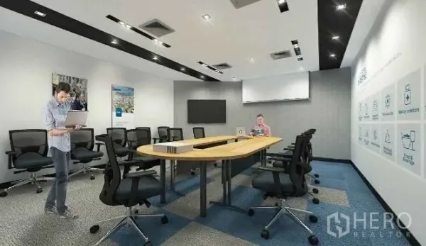 Office Space for rent in Chatuchak, Bangkok - Boardroom with long conference table, swivel chairs and ceiling spotlights.