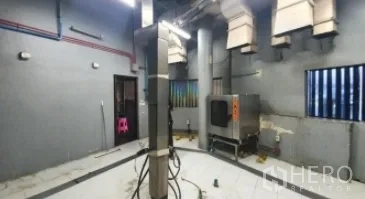Retail Space for rent in Khlong Toei, Bangkok - Commercial kitchen area showing stainless exhaust system and service door.