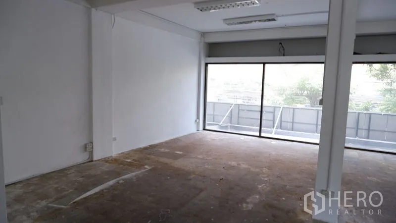 Office Space for rent in Watthana, Bangkok - Private zone within the open office next to a large sliding window.