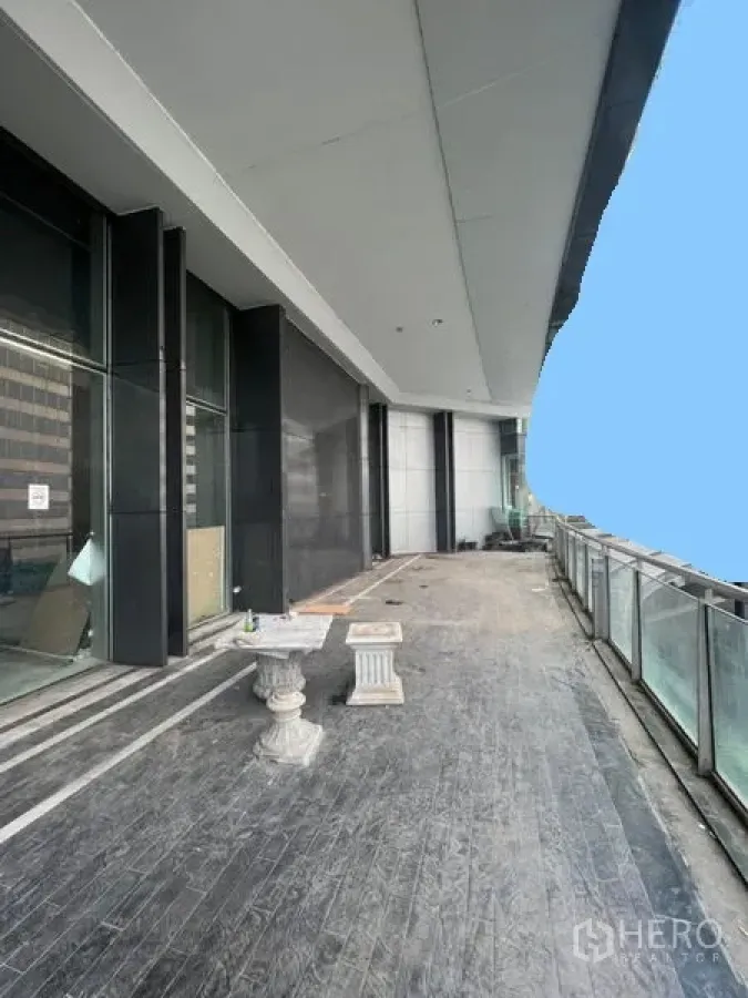 Retail Space for rent in Sathon, Bangkok - Wide outdoor terrace with glass balustrade fronting a modern CBD building.