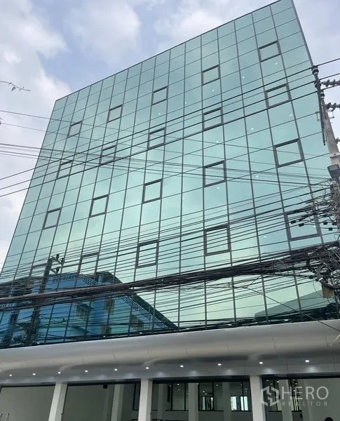 Home Office for rent or sale in Wang Thonglang, Bangkok - Front glass curtain-wall façade of the Bangkok home office.