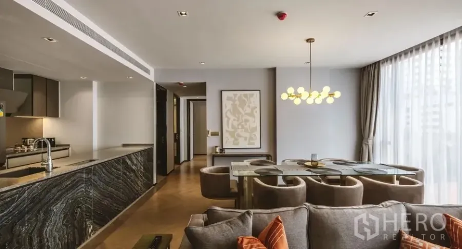 Condominium for rent in Watthana, Bangkok - Master bedroom with two corner windows, chaise and writing desk