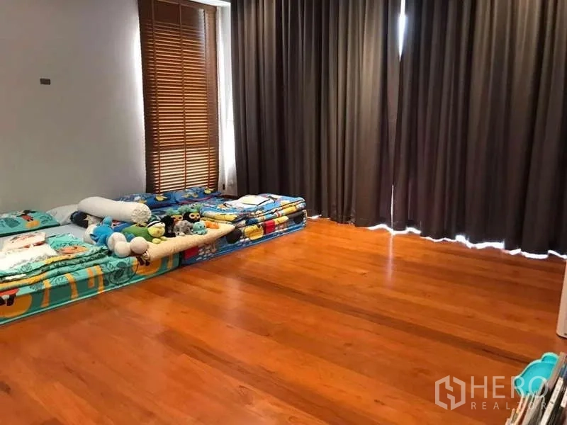 Detached House for rent in Bang Phli, Samut Prakan - Bedroom angle showing wide windows and blackout curtains