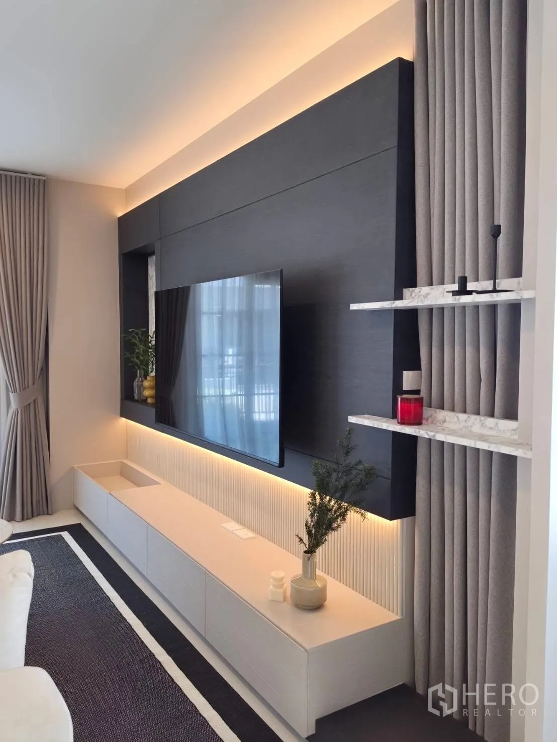 Detached House for rent in Bang Phli, Samut Prakan - Living room TV feature wall with backlighting and media console.