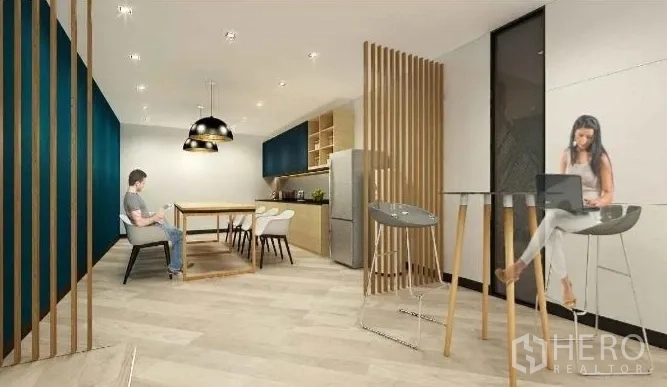 Office Space for rent in Chatuchak, Bangkok - Pantry and breakout area with dining table, high-top counter and warm wood accents.