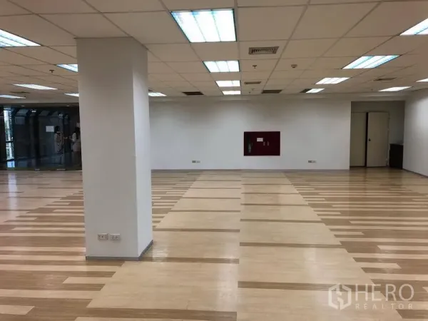 Office Space for rent in Bang Na, Bangkok - Bright office floor with grid ceiling lights and a wide open area for flexible layouts.