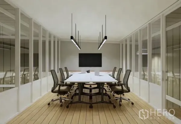 Warehouse for rent in Prawet, Bangkok - Contemporary meeting room concept with long conference table, task chairs and linear pendant lights behind glass partitions.