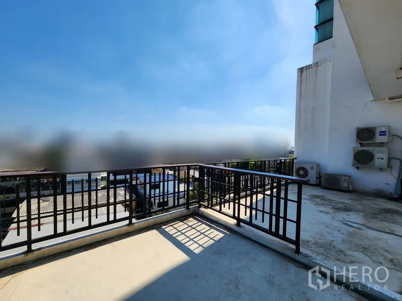 Retail Space for rent in Bang Rak, Bangkok - Private outdoor terrace with black railing and open city outlook.