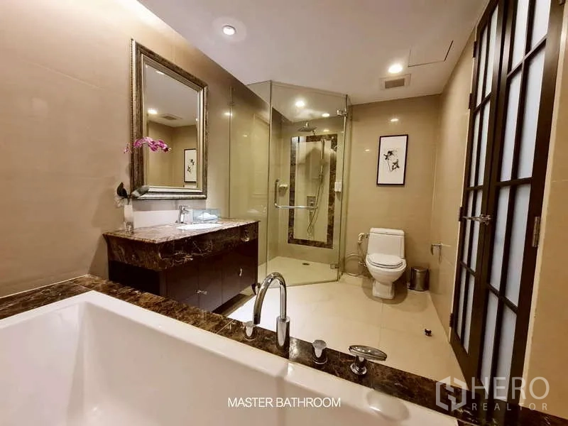 Retail Space for rent in Watthana, Bangkok - Luxury bathroom with bathtub, glass shower, and marble-top vanity