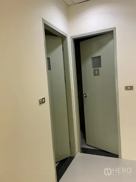 Office Space for rent in Watthana, Bangkok - In-suite restrooms with separate doors inside the office.