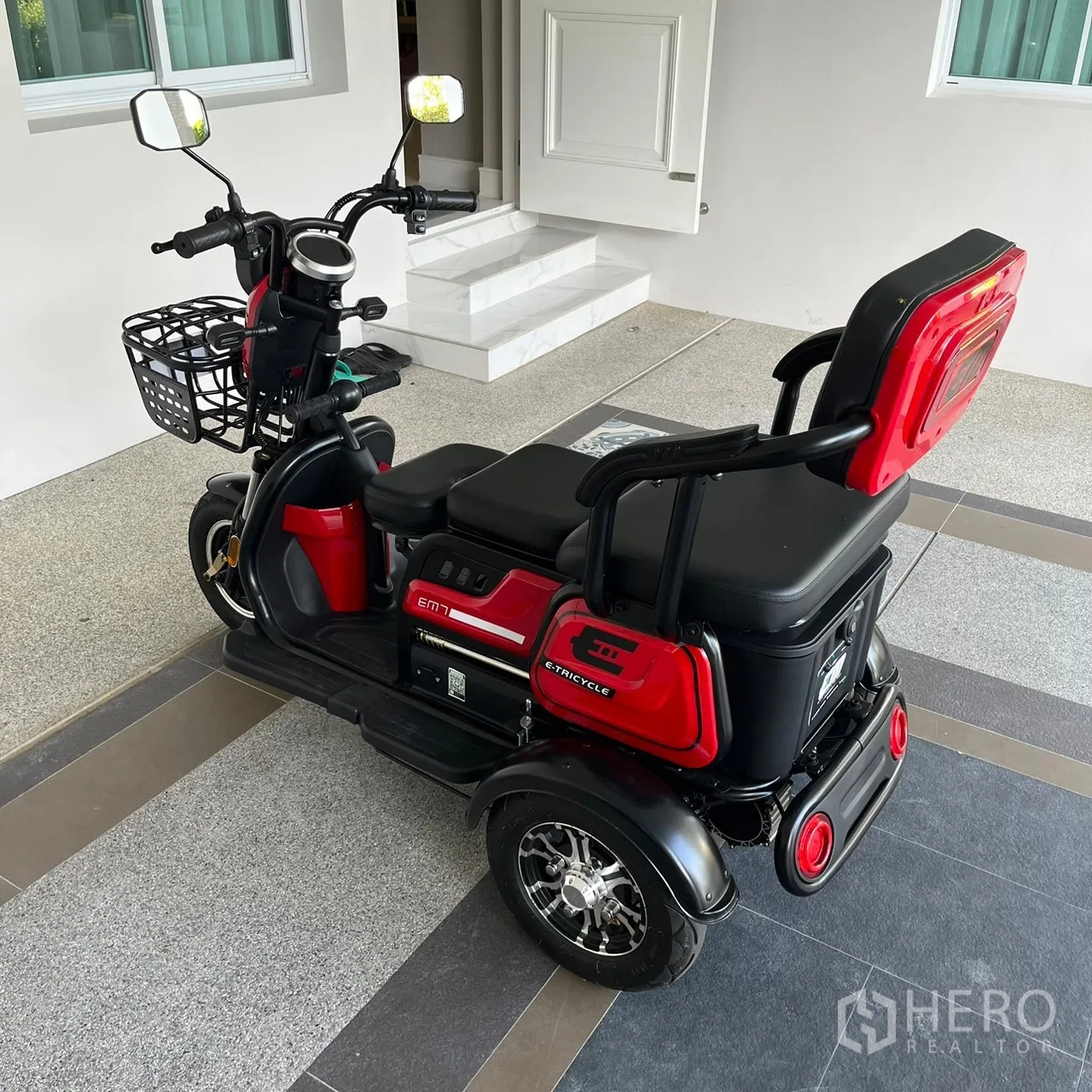 Detached House for rent or sale in Bang Khen, Bangkok - Electric scooter parked under the covered carport.