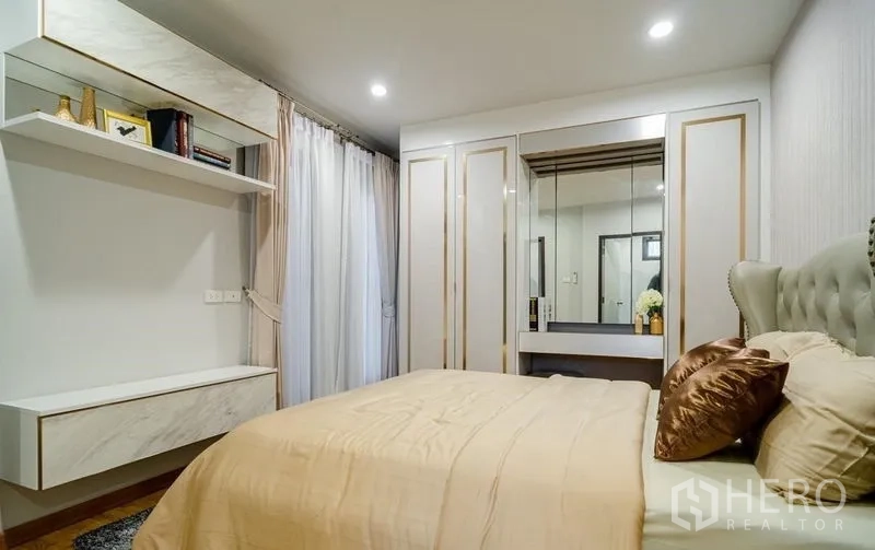 Detached House for sale in Lam Luk Ka, Pathum Thani - Second bedroom angle showing built-in dresser and curtains.