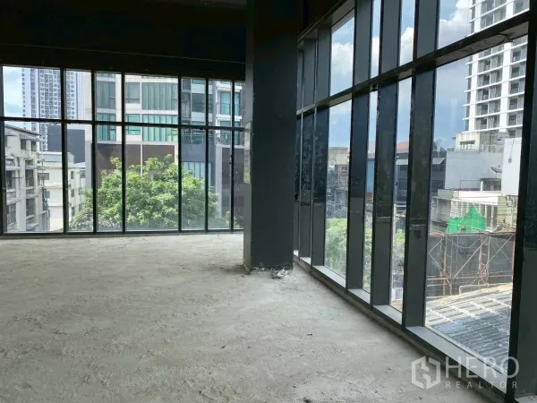 Retail Space for rent - Corner glazing floods the retail space with natural light and neighborhood views.