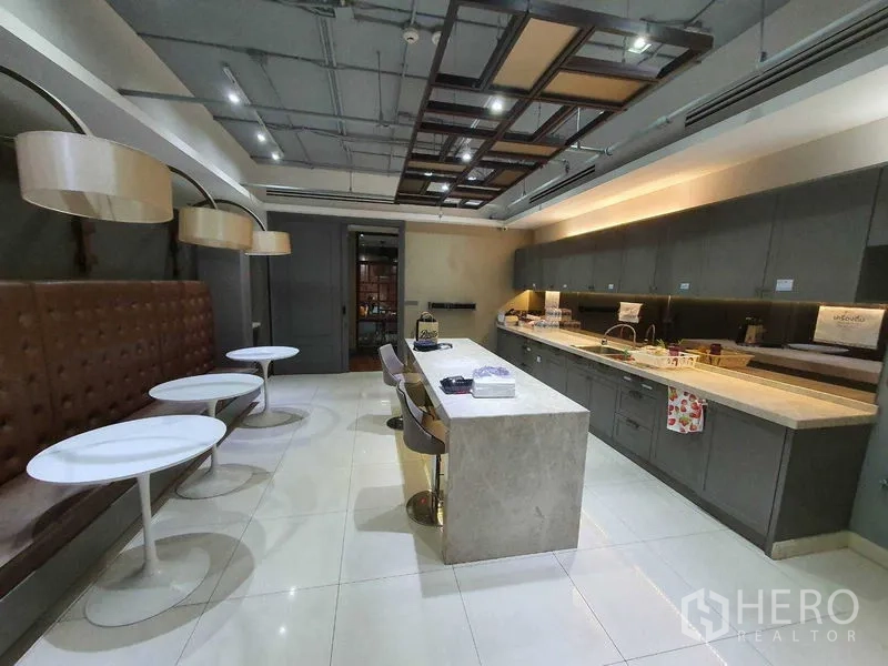 Office Space for rent in Watthana, Bangkok - Pantry and staff canteen with long island, banquette seating and full kitchenette.