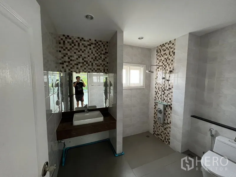 Home Office for rent or sale - Spacious bathroom with mosaic feature tiles, window and walk-in shower.