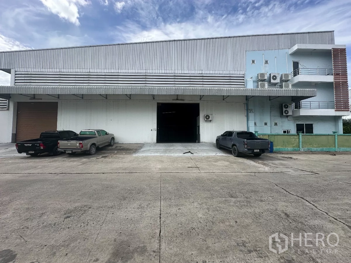 Factory for rent - Front loading bays with two automatic roller shutter doors and wide apron.