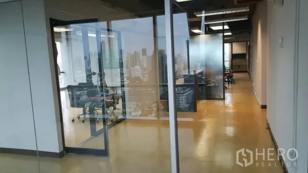 Office Space for rent in Khlong Toei, Bangkok - Glass-partitioned office with meeting room and Bangkok skyline views in Phra Khanong.