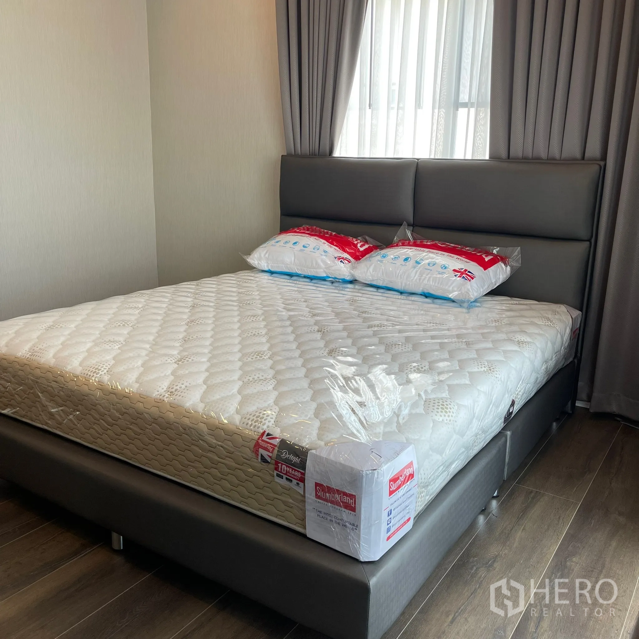 Detached House for rent or sale in Bang Khen, Bangkok - Bedroom with brand new mattress and upholstered bed frame.