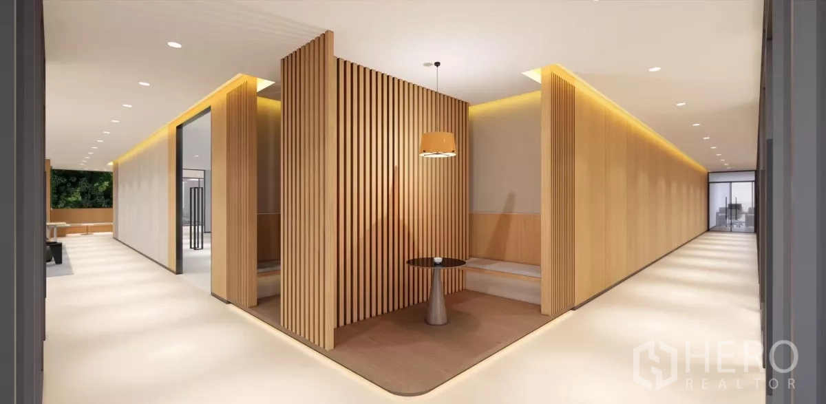 Office Space for rent in Huai Khwang, Bangkok - Hallway featuring built‑in booth seating and warm wood accents under recessed lighting.