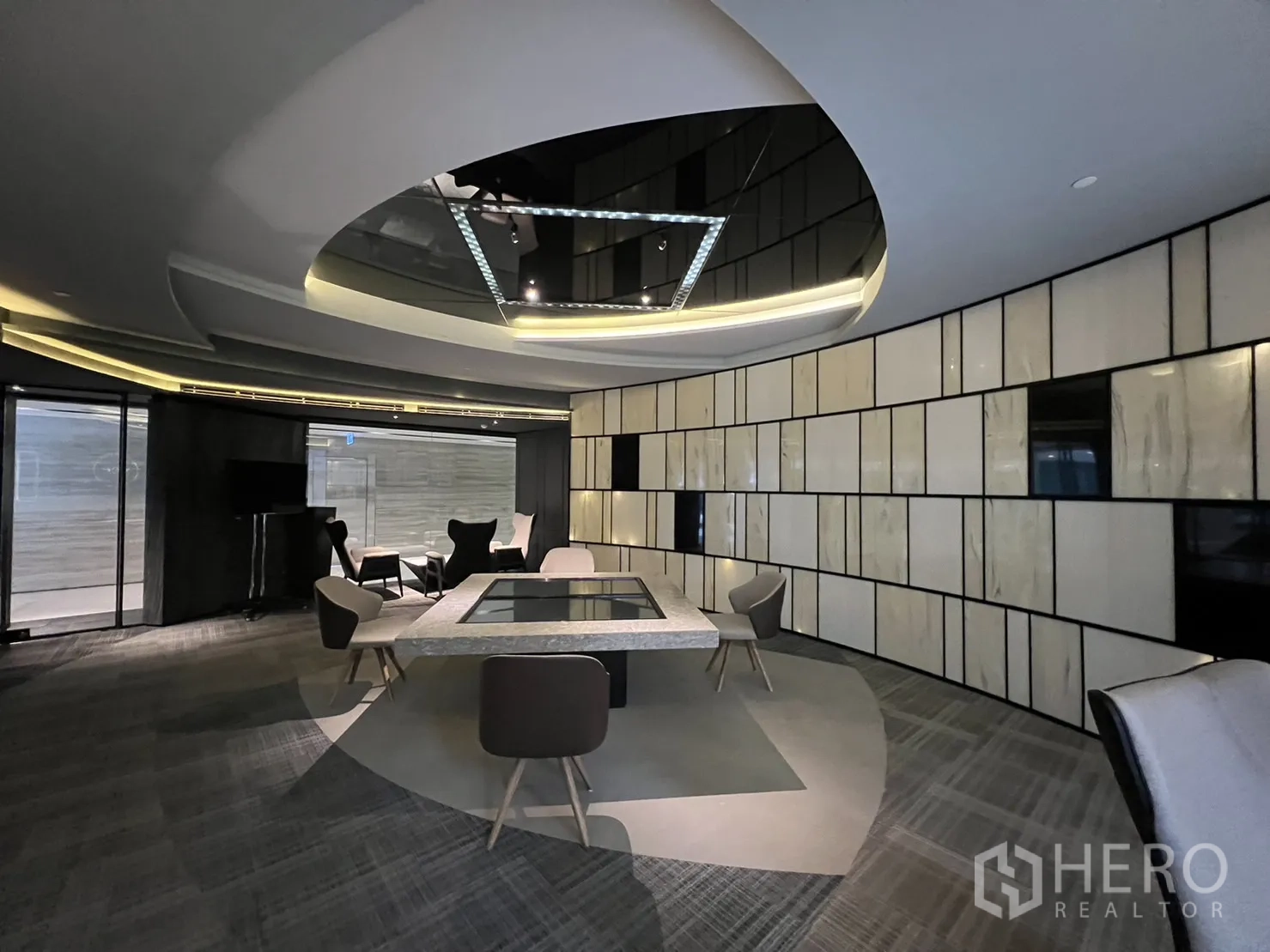 Retail Space for rent in Watthana, Bangkok - Spacious retail floor with floor-to-ceiling windows, statement ceiling design and decorative panel walls.