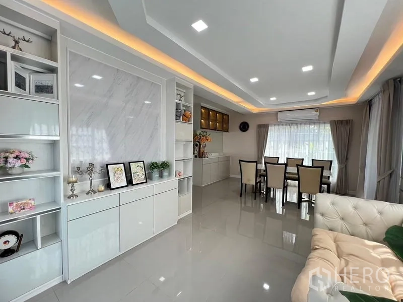 Detached House for rent or sale - Open-plan living and dining with built-in cabinetry and LED ceiling lights.