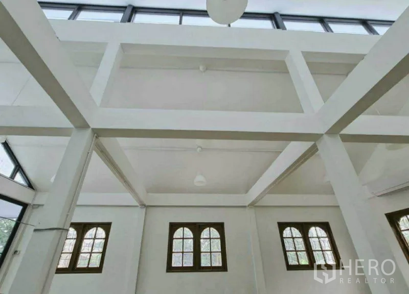 Home Office for rent in Lat Phrao, Bangkok - Detail of high ceiling beams and clerestory windows bringing in natural light.
