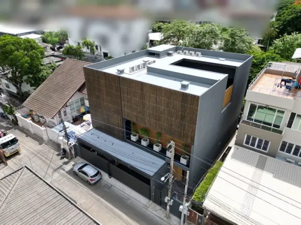 Detached House for rent or sale in Bangkok - Aerial view of contemporary box-shaped home with rooftop equipment and central courtyard void.
