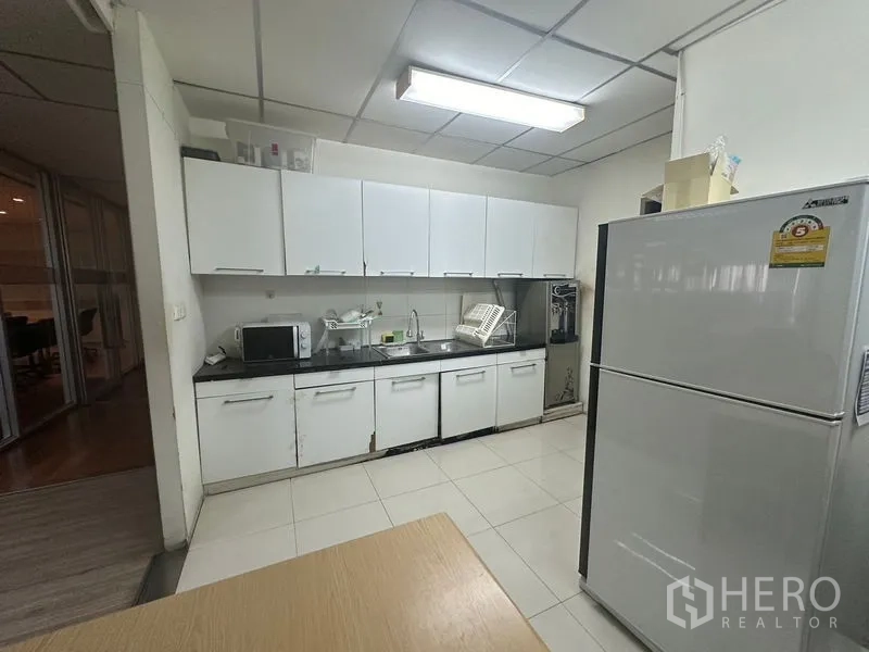 Office Space for rent - Staff pantry with fridge, microwave and long cabinetry