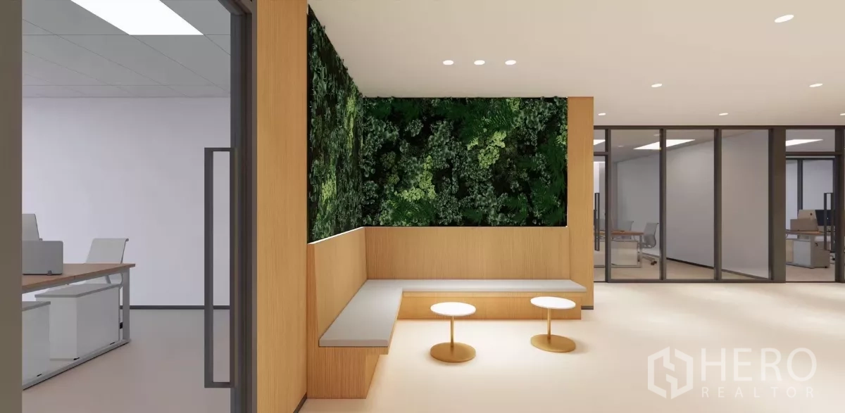 Office Space for rent in Huai Khwang, Bangkok - Corner waiting area with bench seating and a living plant wall next to glass-partitioned offices.