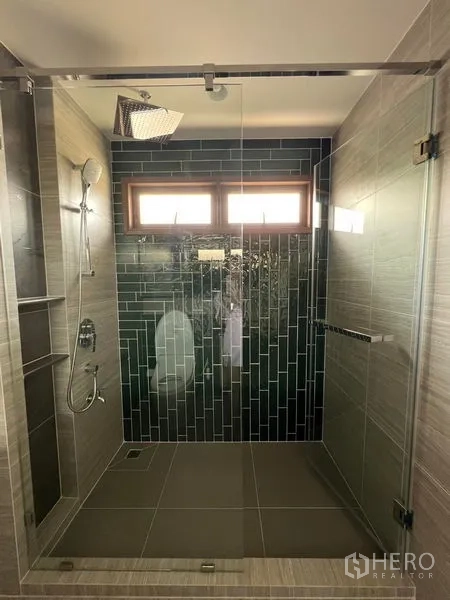 Detached House for rent in Bang Kapi, Bangkok - Walk-in shower with green tile feature wall and rain shower.