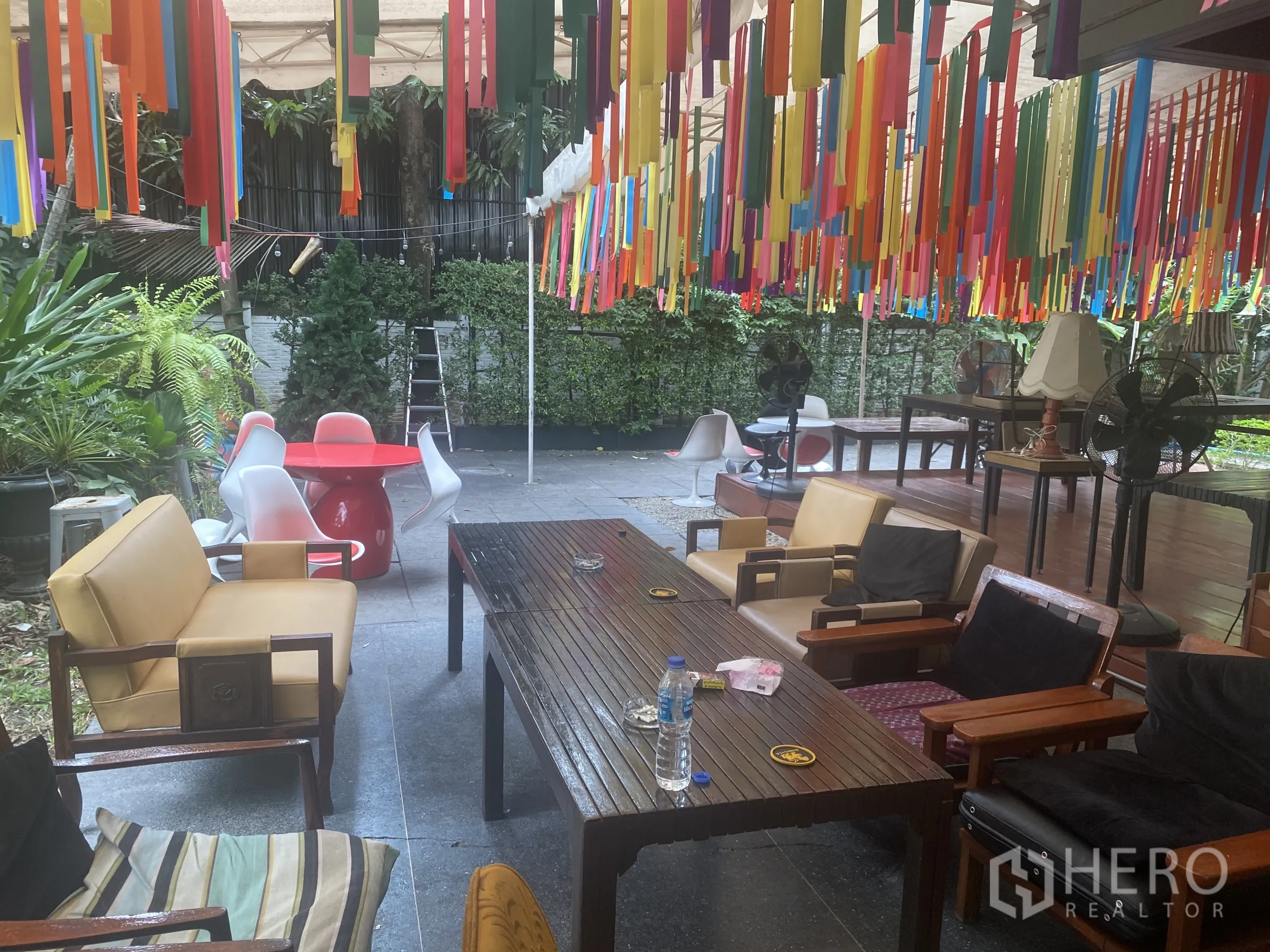 Retail Space for rent in Watthana, Bangkok - Outdoor seating zone with sofas and tables beneath a ribbon canopy.