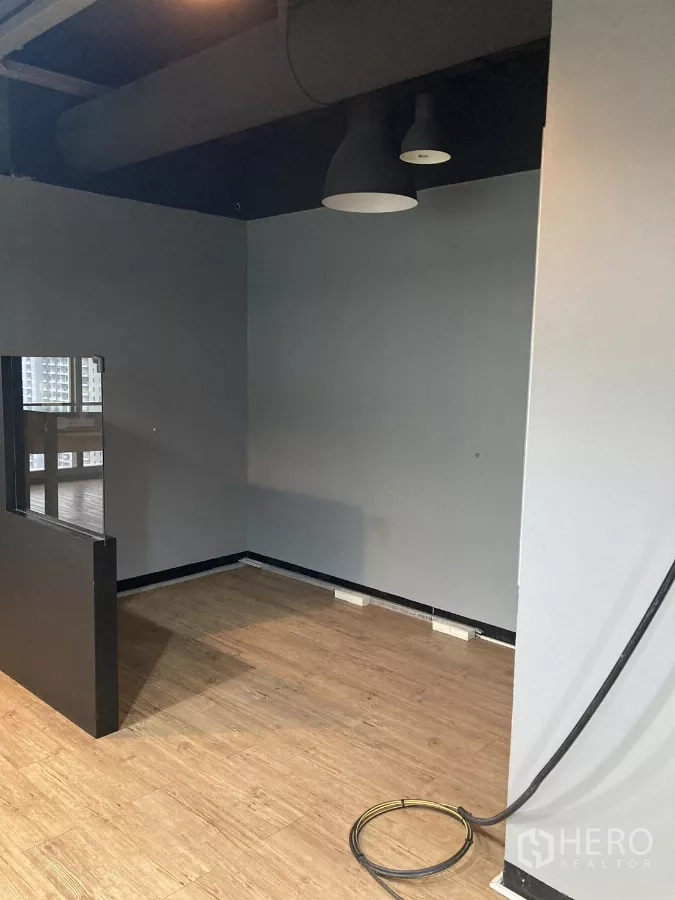 Office Space for rent in Watthana, Bangkok - Small private nook with wood flooring and exposed ceiling in the Watthana office.