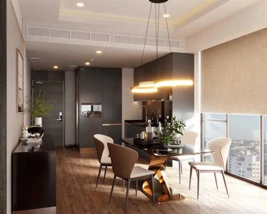 Condominium for rent in Khlong Toei, Bangkok - Modern kitchen and dining zone with sleek cabinetry, statement lighting and floor-to-ceiling windows.