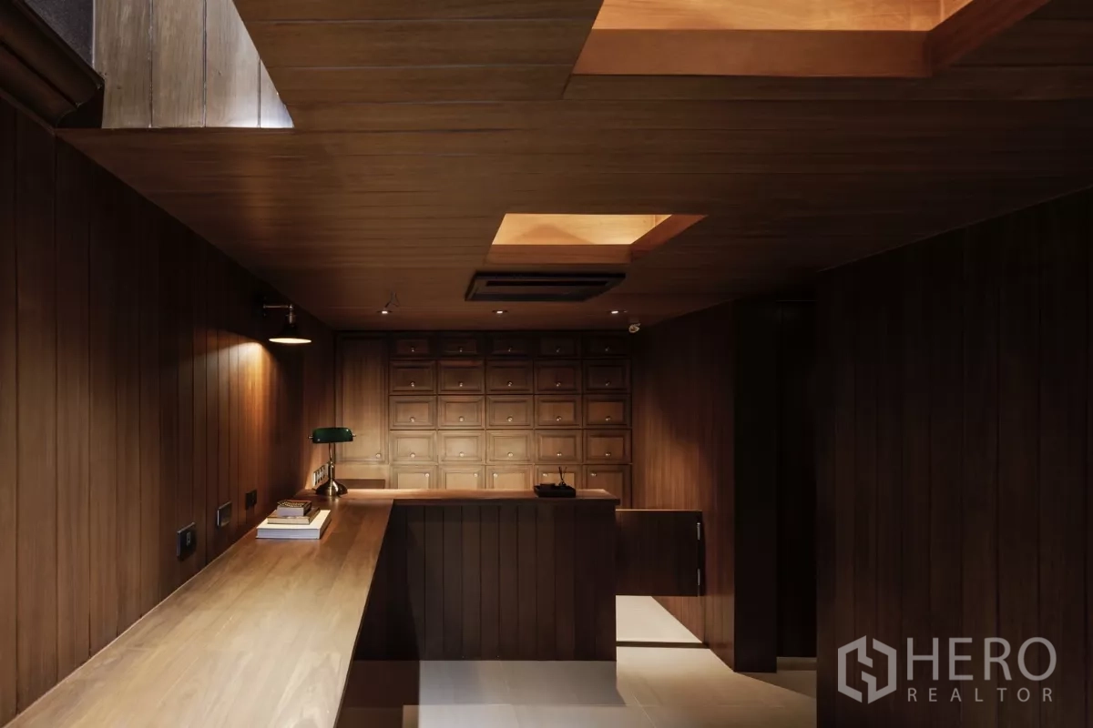 Office Space for rent in Bang Rak, Bangkok - Reception counter with wood cabinetry, drawers and ambient downlights