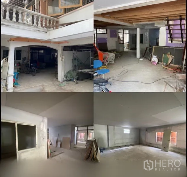 Home Office for rent in Suan Luang, Bangkok - Large open-plan ground floor with columns, construction materials and newly plastered rooms.